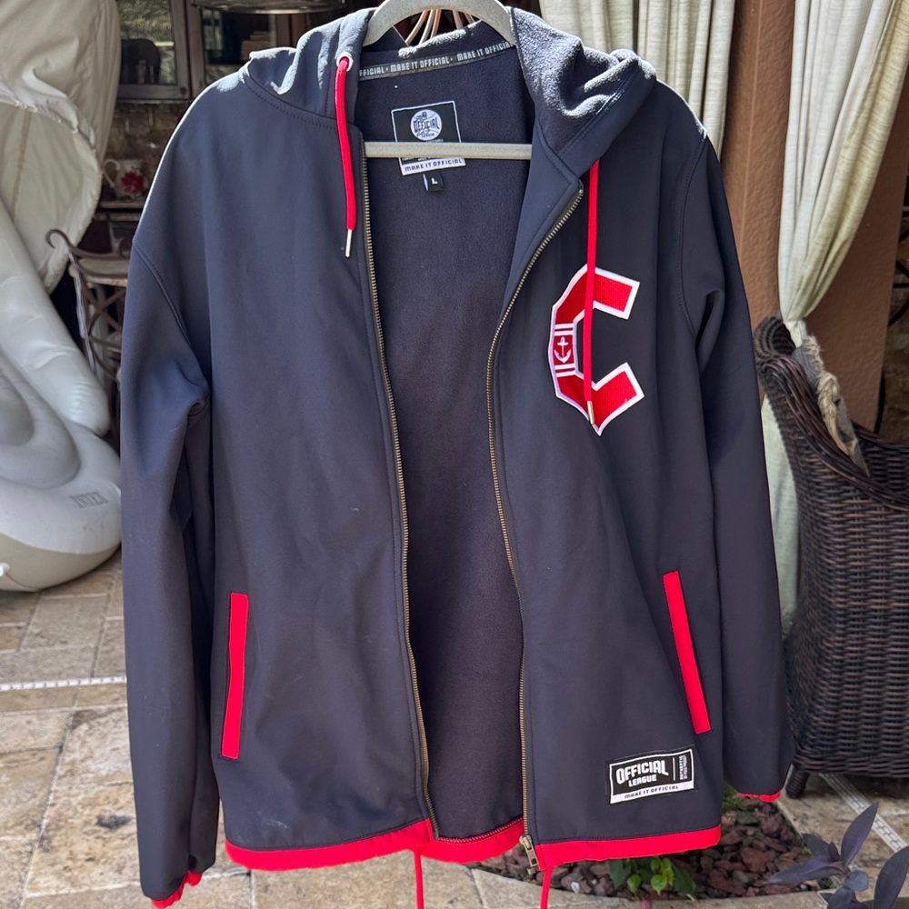 Navy and Red Hooded Jacket with Logo
CLEVELAND GUARDIAN MINOR LEAGUE TEAM GEAR